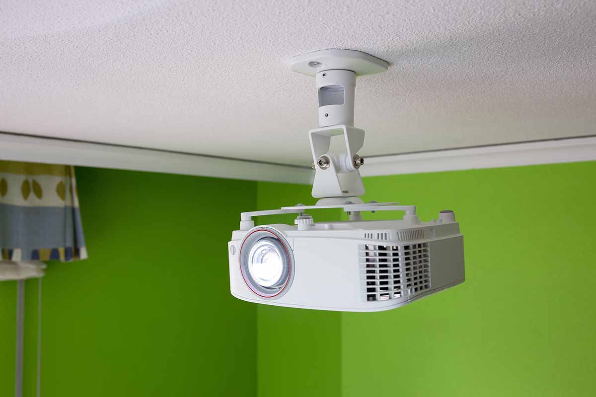A projector on the ceiling saves space and is always aligned correctly .