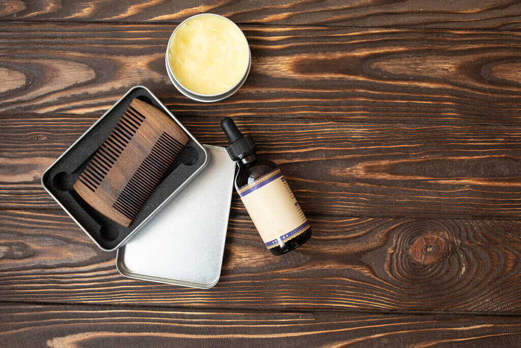 photo of beard care products on a wooden table
