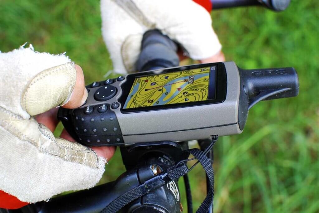 Person adjusting cycle computer