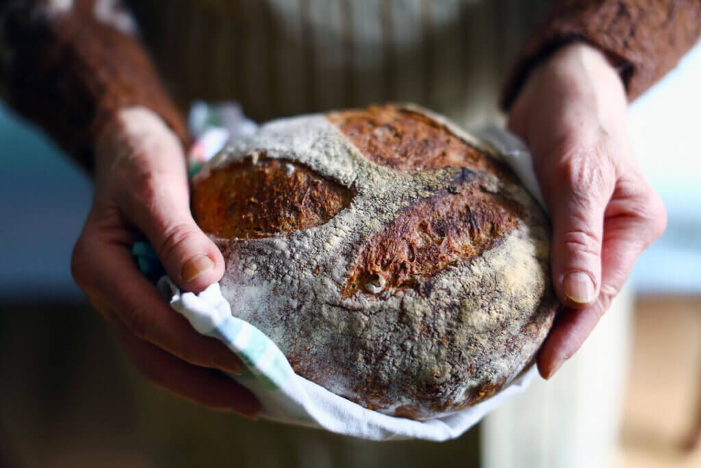 man holding bread