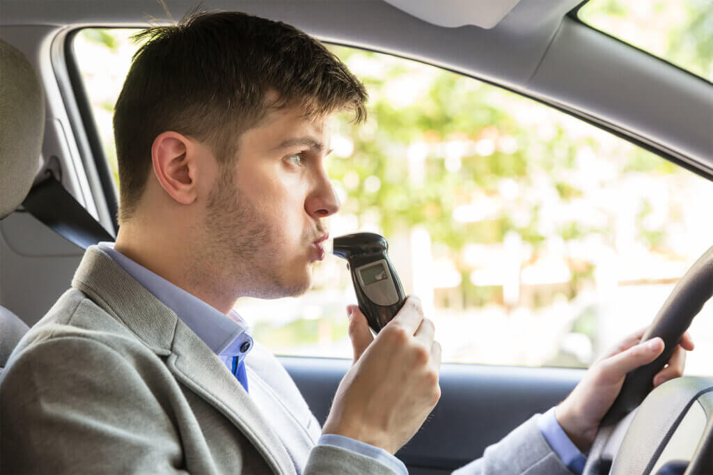 Man uses breathalyser