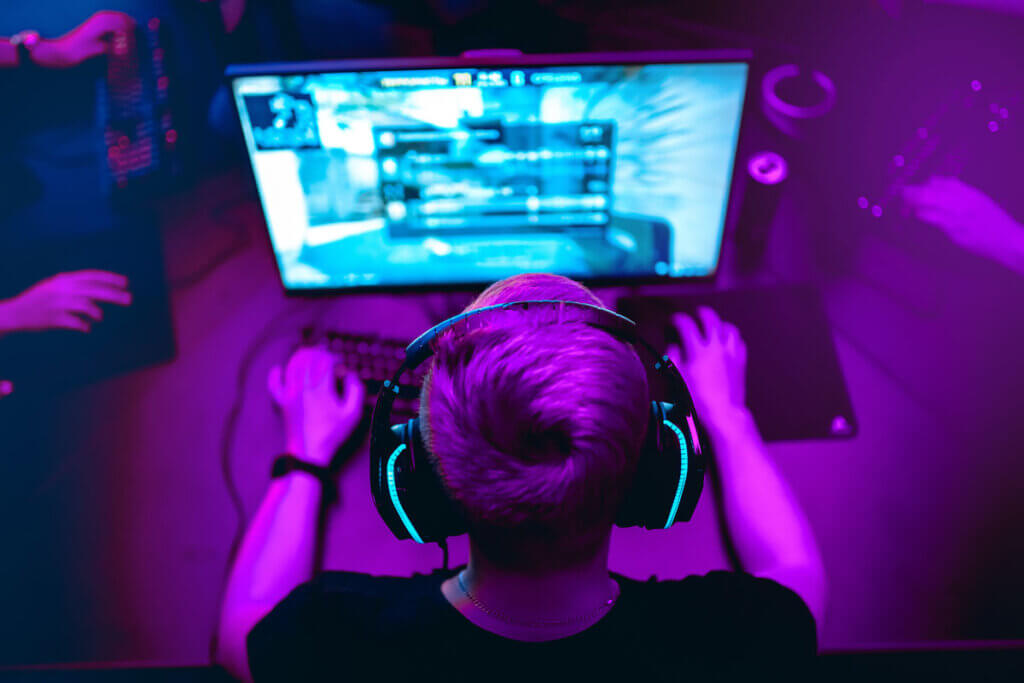 Man playing on a gaming setup