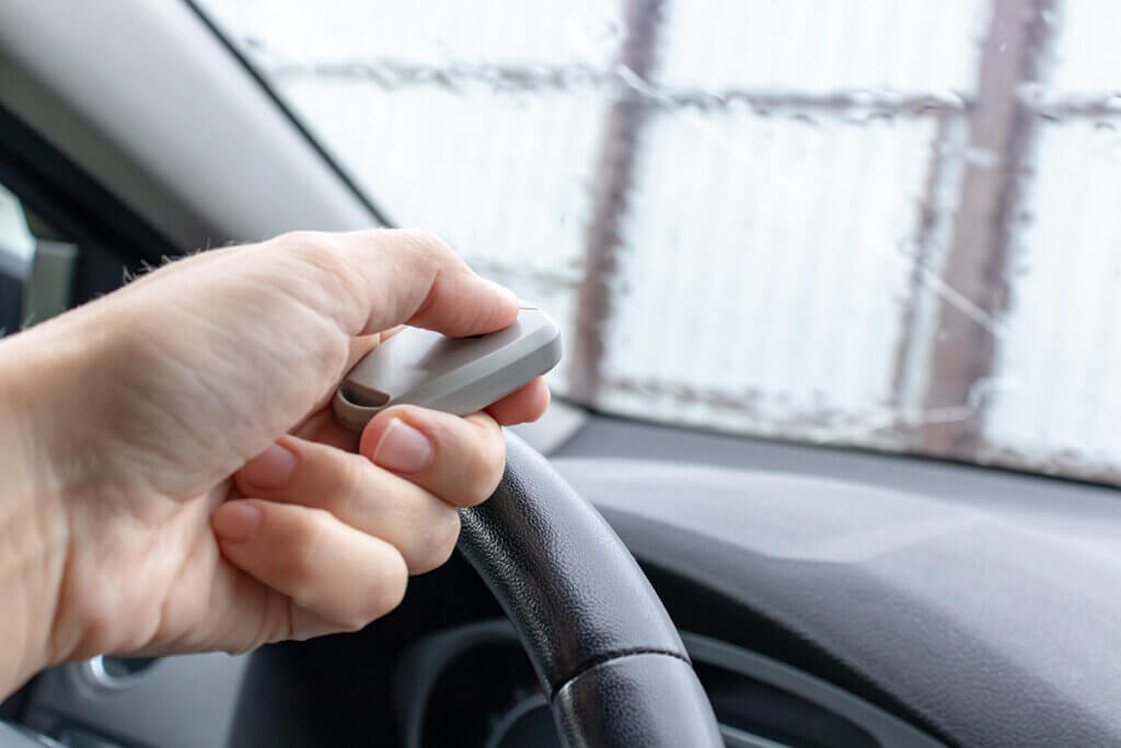 man opens garage door from the car