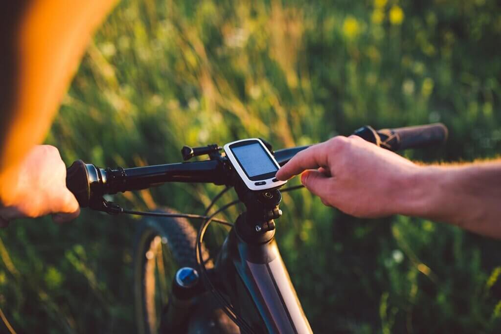 cyclist operates navi during ride