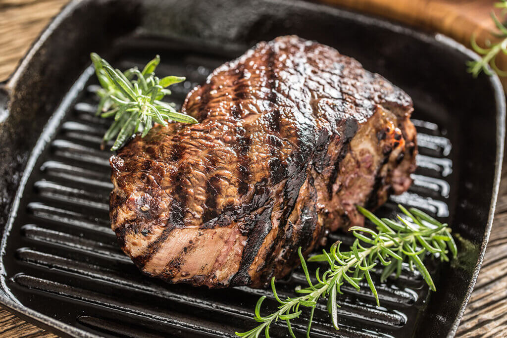 perfectly grilled steak in grill pan