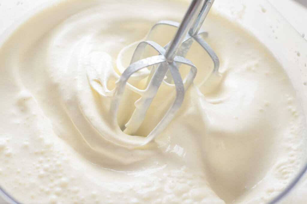 mix_batter_until_frothy_with_hand_mixer