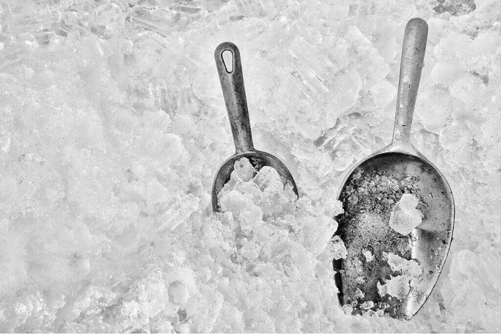 ice cubes with two shovels
