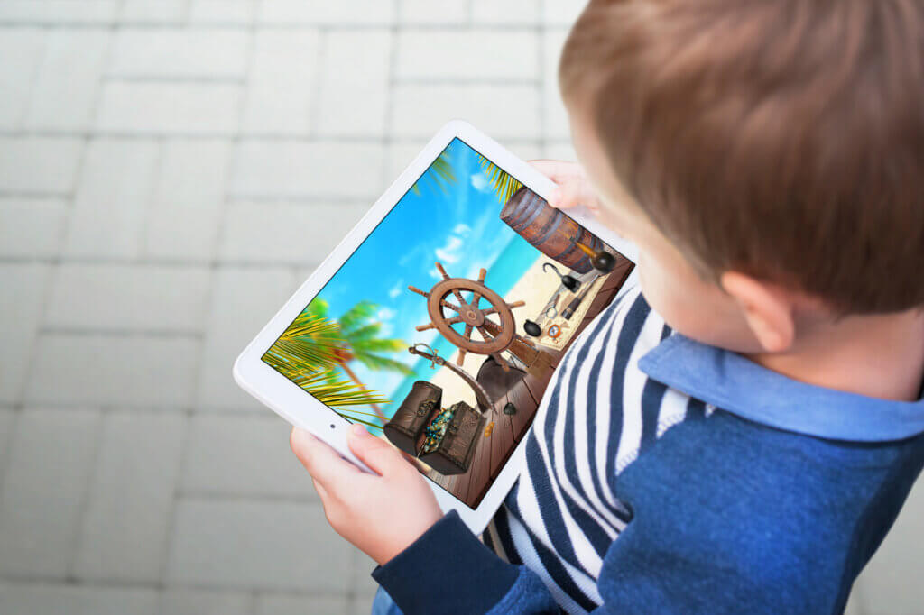 boy watching a video on tablet