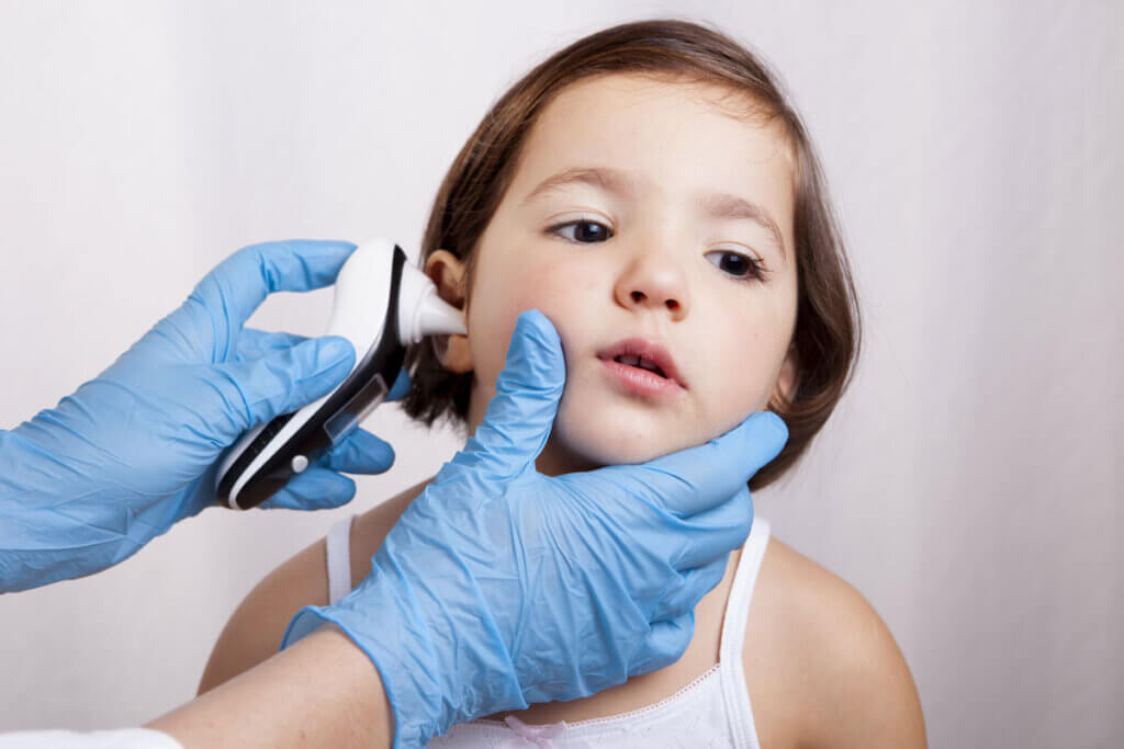 taking a temperature in a child's ear