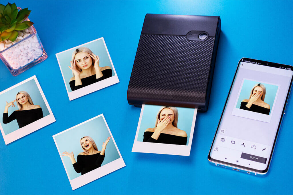 small mobile photo printer uses zero-ink technology