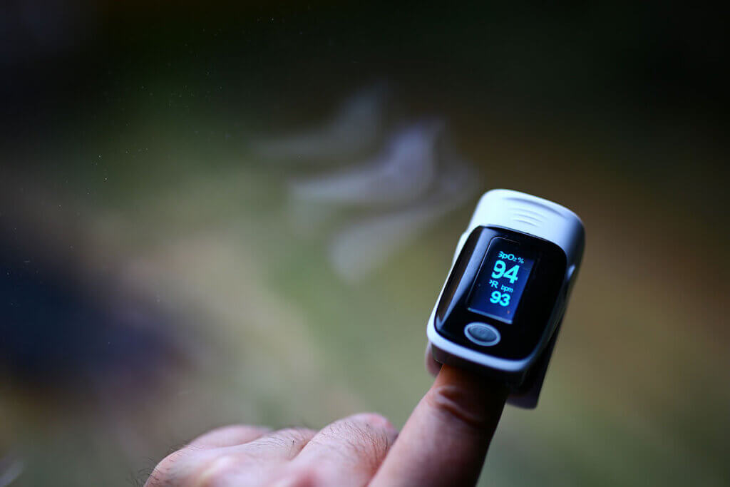 Pulse oximeter measures oxygen saturation on the index finger