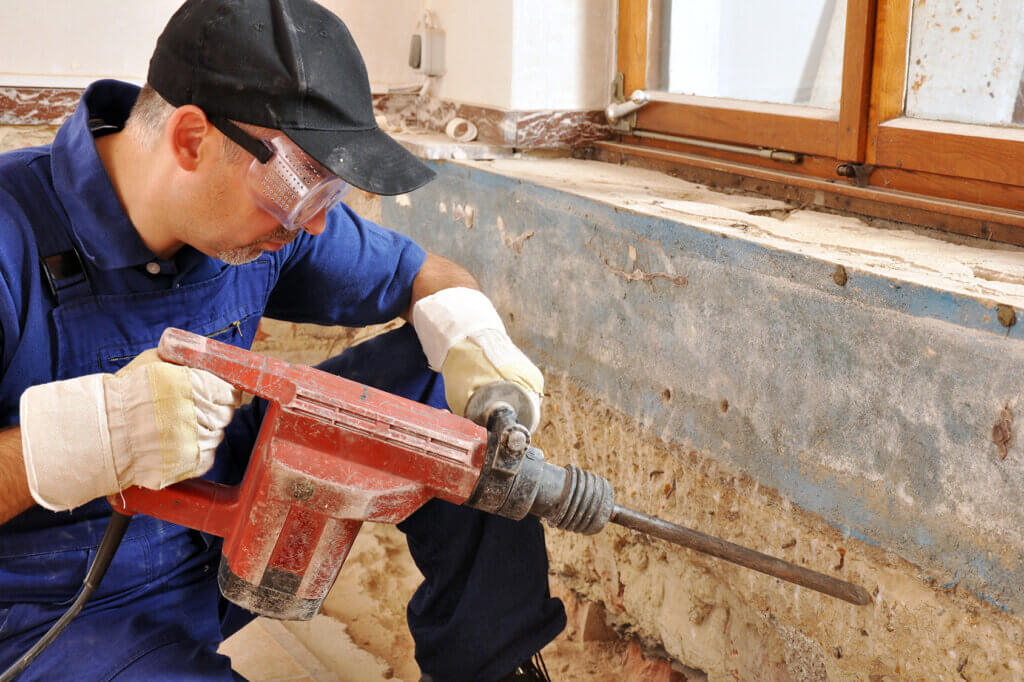 man using rotary hammer