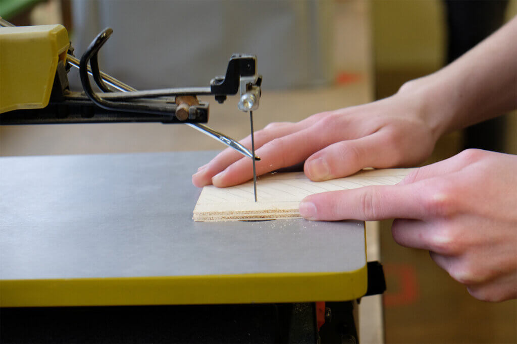 Sawing with a scroll saw