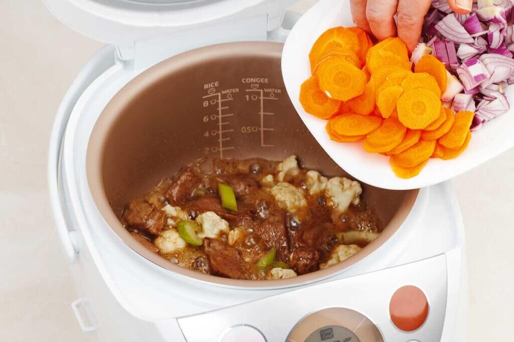 Ingredients are put into slow cooker