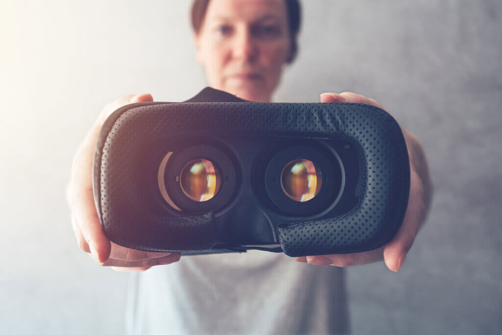 woman showing the inside of VR goggles